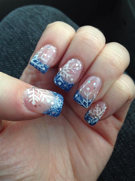 snowflake designs on nails|french tip nails with snowflakes.